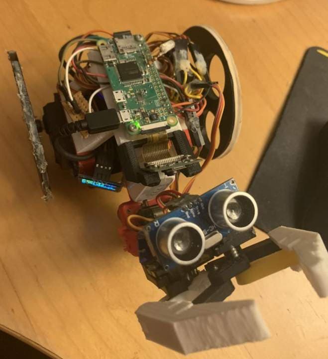 Originally meant to help me “clean my room remotely,” this three-wheel robot evolved into a PS4-controlled rover with a camera, ultrasonic sensor, and claw arm. Built with Raspberry Pi and OpenCV, it detected and grabbed objects autonomously or via controller.