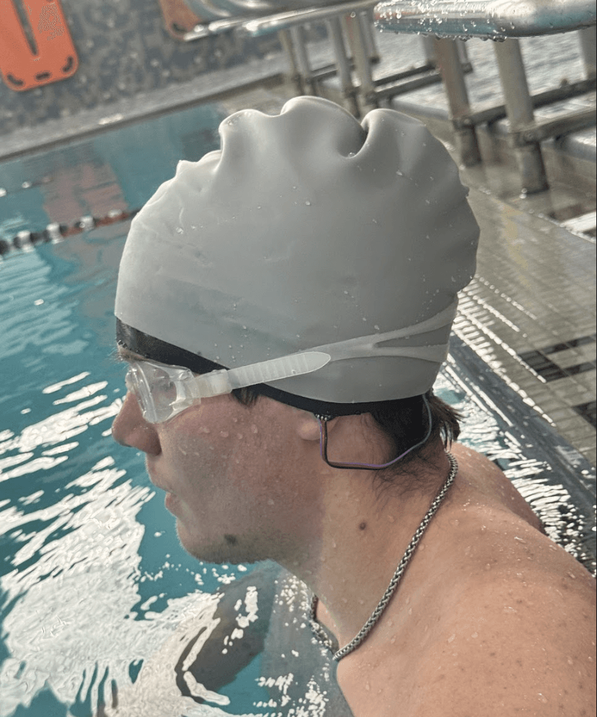 SwimSense is a wireless, wearable, waterproof device equipped with IMU, PPG, and temperature sensor for realtime health sensing and reporting for aquatic environments. Originally as a research collaboration with MIT Media Lab and Dept. of Mechanical Engineering, I am now independently developing SwimSense to improve comfort, battery life, and data quality. The device aims to provide swimmers and coaches with detailed insights into performance and physiological metrics during training.